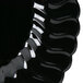 A close up of a Fineline Flairware black plastic plate with wavy lines.