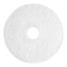 A white circular Lavex Basics floor machine pad