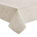 A white Snap Drape table cover with a floral pattern.