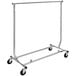 An Econoco chrome metal garment rack with wheels.