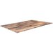 A Holland Bar Stool rustic wood table top on a wooden table.