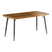 A Lancaster Table & Seating butcher block table with black legs.