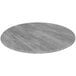 A grey circular table top.
