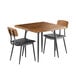 A Lancaster Table & Seating Mid-Century square butcher block table with black chairs and wooden tops.