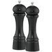 Two black Chef Specialties Windsor pepper mills.