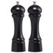 A black pepper mill and salt mill set with silver tops.