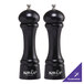 Two black oval Chef Specialties pepper mills with white text on them.