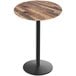 A round wooden Holland Bar Stool EuroSlim table with a black base.