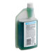 A white bottle of SC Johnson Professional Quaternary Disinfectant Cleaner with a green label.