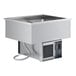 A ServIt drop-in refrigerated cold food well with two pans in a stainless steel counter.