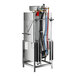 A Jackson TempStar door type dishwasher with many hoses and wires.