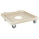 A tan plastic dolly base with wheels.