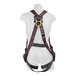 A mannequin wearing a black and red KStrong full-body safety harness with tongue buckle legs.