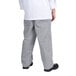A person wearing grey Houndstooth baggy cook pants.