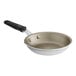 A Vollrath Wear-Ever aluminum non-stick fry pan with a black silicone handle.