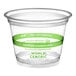 A clear plastic World Centric compostable cup with a green label.