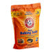 A white bag of Arm & Hammer baking soda.