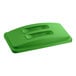 A lime green plastic rectangular compost receptacle lid with a handle.