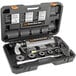 A black plastic case with a General Pipe Cleaners Kinetic Water Ram drain cleaning tool inside.