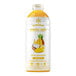 A Smartfruit Aloha Pineapple Puree bottle with a white label and lid filled with yellow liquid.