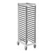 A metal Cambro sheet pan rack with wheels.