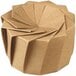 A brown Solia origami bowl with a spiral design made of folded paper.