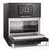 A black and silver Merrychef conneX16 high-speed oven with a digital display showing icons.