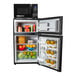A black two-door reach-in refrigerator and freezer with a microwave on top, stocked with food and beverages.