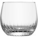A clear Zwiesel Glas double old fashioned glass with a curved edge.