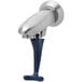 A metal faucet with a dark blue push-back actuation arm.