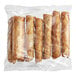 A plastic bag with Ruiz Foods French Toast & Sausage Tornado taquitos inside.