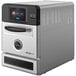 A silver and black Midea G1 FlashChef high-speed oven on a counter.