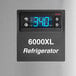 A Delfield 6051XL-S reach-in refrigerator with a digital temperature display.