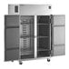 A Delfield two section reach-in refrigerator with open doors.