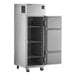 A silver Delfield reach-in refrigerator with a door open.