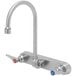 An Eversteel stainless steel wall mount mixing faucet with swivel gooseneck spout and red and blue knobs.