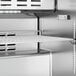 The metal shelf of an Avantco 48" Mega Top Sandwich Prep Table.