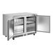 A stainless steel undercounter refrigerator with two open doors and interior shelving.