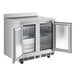 An Avantco stainless steel worktop freezer with two doors open.