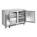 A stainless steel Avantco undercounter freezer with two doors open.