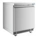 A stainless steel undercounter freezer with a solid door and front ventilation, mounted on casters.