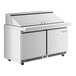 An Avantco stainless steel 2 door refrigerated prep table on wheels.