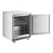 An Avantco silver undercounter refrigerator with a door open.