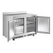 An Avantco stainless steel worktop freezer with two doors open.