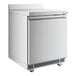 An Avantco white worktop refrigerator with a door open.
