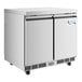 An Avantco stainless steel undercounter freezer with two doors on wheels.