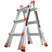 A Little Giant industrial ladder with orange accents and handles.