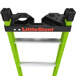 A green Little Giant ladder with black handles and a white Little Giant Quad Pod tray attached.