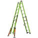 A green Little Giant Conquest 2.0 ladder with black handles.