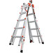 Two Little Giant aluminum ladders with wheels and ratchet levelers.